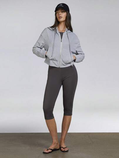 Athîral Sudadera con capucha de manga larga con cremallera delantera, de un solo color y hombros caídos para mujer