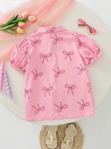 女孩粉色蝴蝶结印花短款泡泡袖纽扣衬衫
