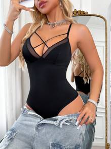 Camisola de mujer de unicolor con parches de malla y cruzada