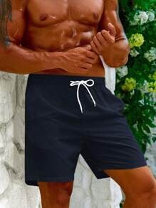 Manfinity Swimmode 男士休闲沙滩短裤（抽象印花），简约时尚，适合夏季