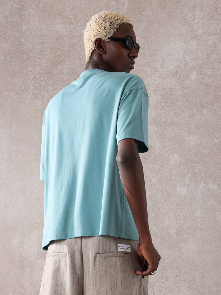 SUMWON Casual Oversized International Studio T-Shirt Streetwear Fashion Urban Loungewear Comfort Fit Summer Spring Relaxed Short Sleeve Tee