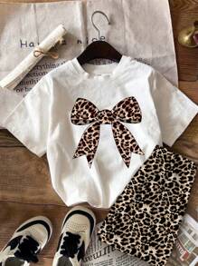 SHEIN Set de 2 piezas con camiseta de manga corta y pantalón corto con estampado de leopardo y decoración de lazo, apropiado para el verano, para niñas preadolescentes