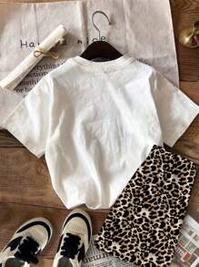 SHEIN Set de 2 piezas con camiseta de manga corta y pantalón corto con estampado de leopardo y decoración de lazo, apropiado para el verano, para niñas preadolescentes