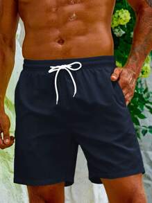 Manfinity Swimmode 男士休闲沙滩短裤（抽象印花），简约时尚，适合夏季