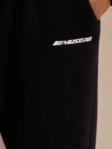 Men Drawstring Waist Contrast Panel "Musero" Slogan Graphic Print Flare Leg Sweatpants SPRING SUMMER - Black and White - View 5