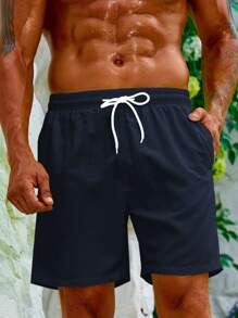 Manfinity Swimmode 男士休闲沙滩短裤（抽象印花），简约时尚，适合夏季