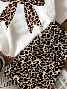 SHEIN Set de 2 piezas con camiseta de manga corta y pantalón corto con estampado de leopardo y decoración de lazo, apropiado para el verano, para niñas preadolescentes