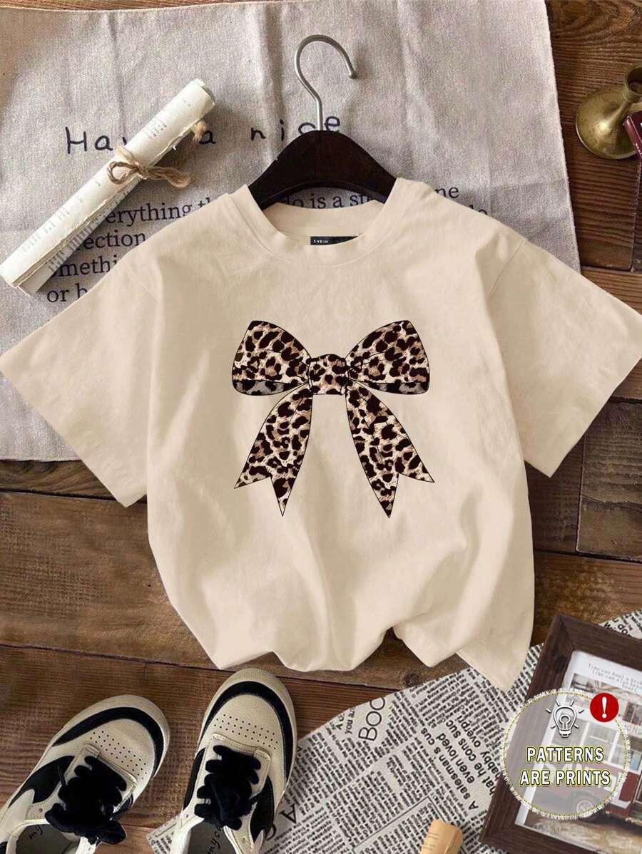 SHEIN Leap Crew Camiseta de cuello redondo de manga corta informal sencilla para niñas preadolescentes, adecuada para primavera/verano - Beis - Ver 1