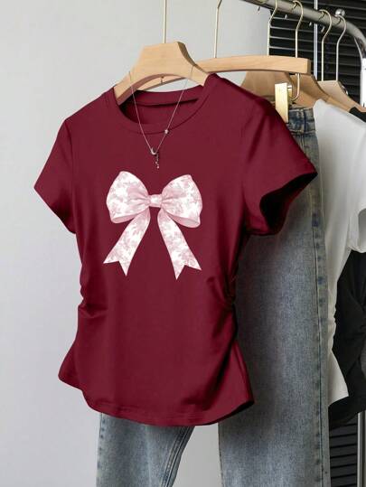 SHEIN Explorewe 少女休闲简约百搭粉色蝴蝶结图案印花收腰短袖 T 恤
