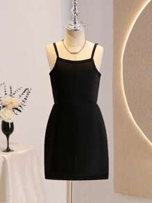 SHEIN Vestido corto de tirantes esencial y versátil para niñas, de color liso, con cintura alta, de tela de satén brillante y estilo minimalista casual para uso diario - Negro - Ver 6
