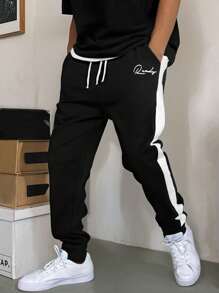 EURMUSE Men Cottonline White Striped Letter Printed Regular Sweatpants - Black - View 1