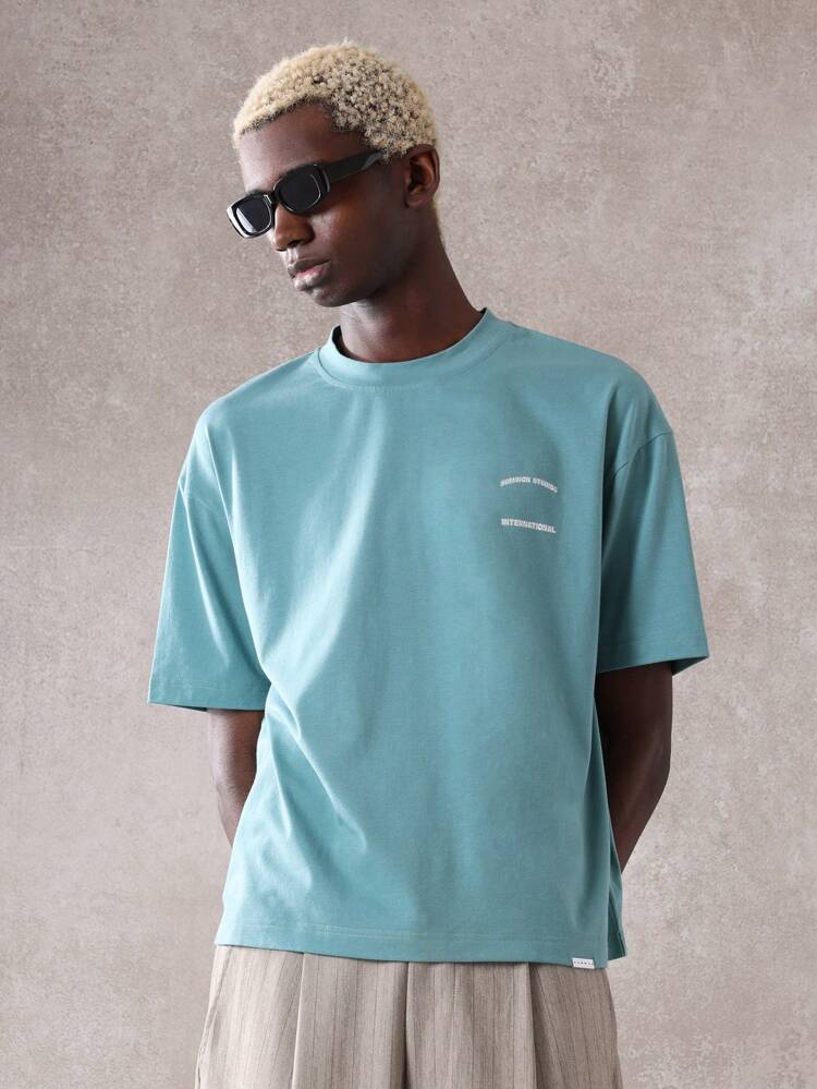 SUMWON Casual Oversized International Studio T-Shirt Streetwear Fashion Urban Loungewear Comfort Fit Summer Spring Relaxed Short Sleeve Tee