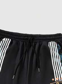 ROMWE MEN Anime Pantalones de chándal sueltos con cordón en la cintura y estampado de letras y leopardo para hombre - Azul - Ver 4