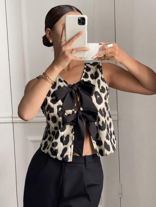 Siren Gaze Camisa casual sin mangas con nudo delantero y estampado de leopardo para mujer