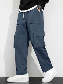 Manfinity Hypemode Loose Men Slogan Graphic Flap Pocket Side Drawstring Cargo Pants - Blue - View 1