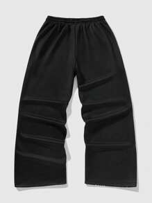 ROMWE MEN Anime Pantalones de chándal holgados con cordón de cintura y estampado de letras y leopardo para hombre