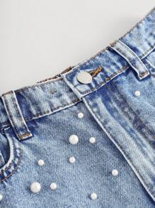 Girlism 这款少女优雅浅色水洗做旧牛仔短裤，带有口袋、仿珍珠装饰和毛边裤脚，适合春夏度假、海滩、波西米亚风音乐会、锐舞派对等场合。 - 淺色水洗藍 - 查看 3