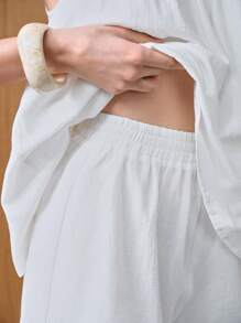 Gloray 2 pièces/ensemble Femme Débardeur en coton tissé sans manches avec short à taille élastique et ourlet à volant, ajustement décontracté et ample