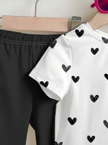 SHEIN 2 件女童休闲卡通图案圆领短袖上衣和喇叭裤套装，夏季