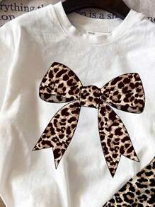 SHEIN Set de 2 piezas con camiseta de manga corta y pantalón corto con estampado de leopardo y decoración de lazo, apropiado para el verano, para niñas preadolescentes