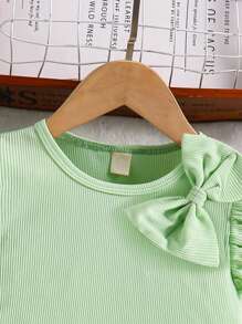 Elladie kids Girls' Cute Versatile Solid Color Ribbed Cap Sleeve Round Neck Bow T-Shirt, Suitable For Daily Wear, Gatherings, Outdoor Activities. It Not Only Has A Fashionable Feel But Also Is Comfortable To Wear, Showcasing The Lively, Cute And Sweet Vibe Of Girls In Summer. Young Girl Tshirts