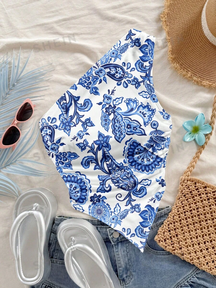 Soleia Blusa asimétrica de hombro con estampado retro de paisley en azul, ideal para vacaciones de verano