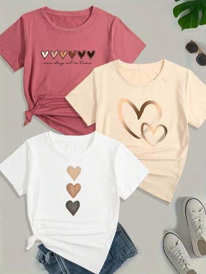 Set de 3 camisetas casuales de manga corta con cuello redondo y estampado de corazón para mujeres