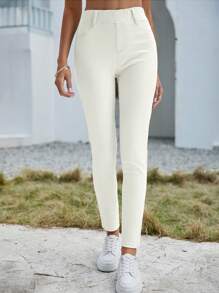 SHEIN Essnce Jeans casuales versátiles de cintura elástica con bolsillos para mujer
