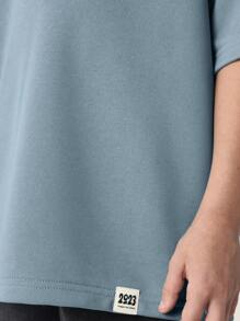 SUMWON Camiseta de ajuste relajado tipo streetwear de la Era "Never Look Back" 2, para verano, casual, de manga corta, con texto de declaración de estilo de vida urbano y moda - Neblina azul - Ver 4