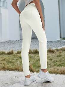 SHEIN Essnce Jeans casuales versátiles de cintura elástica con bolsillos para mujer