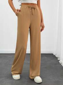 EURMUSE Women Beige Textured Fabric Drawstring Detailed Straight Fit Pant - Beige - View 1