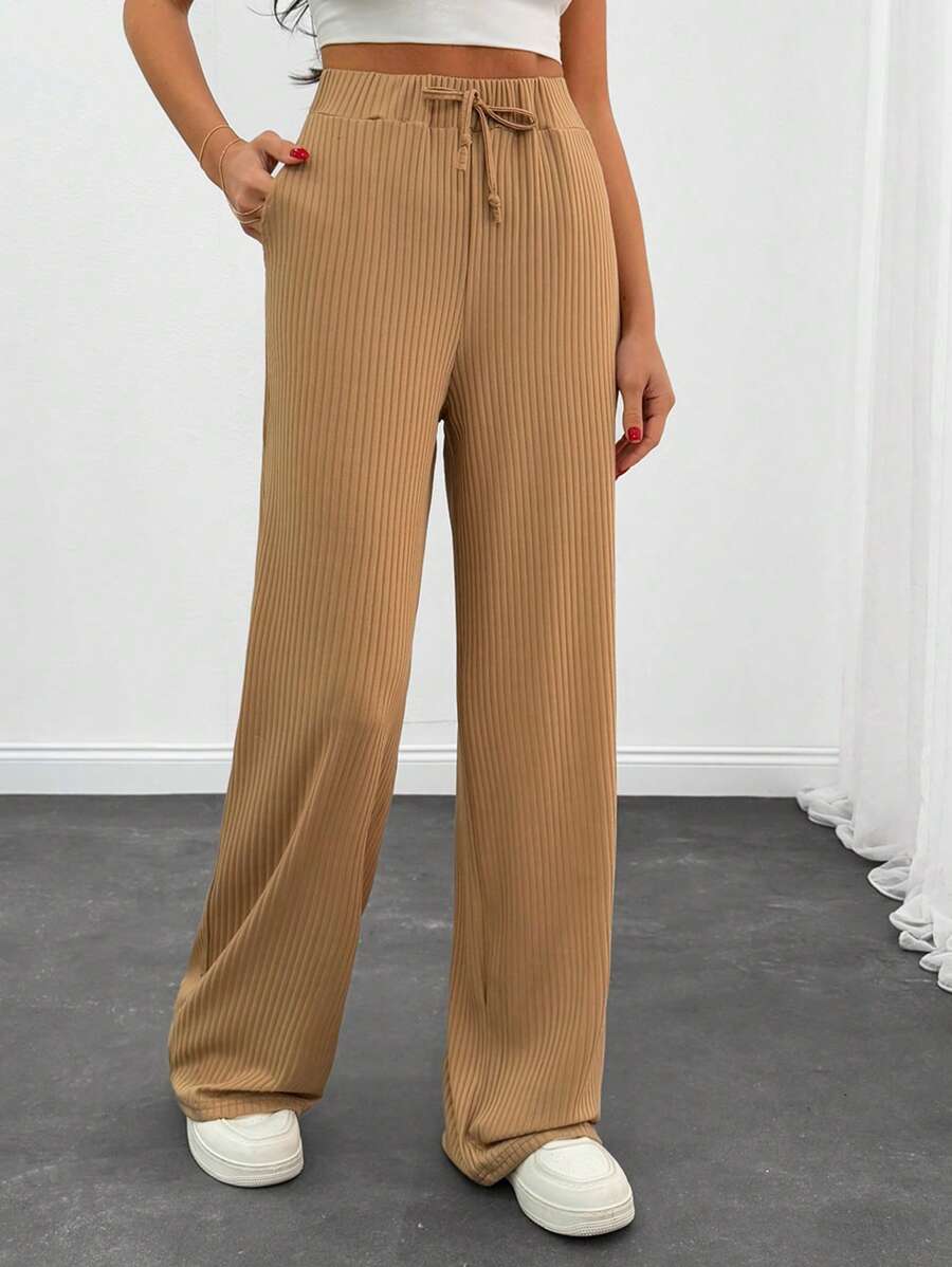 EURMUSE Women Beige Textured Fabric Drawstring Detailed Straight Fit Pant - Beige - View 1