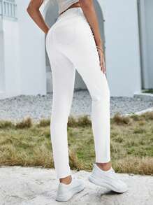 SHEIN Essnce Pantalones largos de mezclilla llanos, simples y de moda, apropiados para el verano