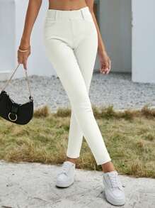 SHEIN Essnce Jeans casuales versátiles de cintura elástica con bolsillos para mujer
