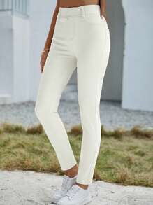 SHEIN Essnce Jeans casuales versátiles de cintura elástica con bolsillos para mujer