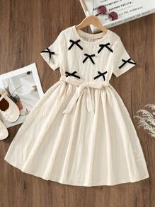 SHEIN Tween Girl Solid Color Knitted Round Neck Bow Decor Textured Waist Fitted Short Sleeve Elegant Dress, Casual Wear, Back To School, Lady Style - Beige - View 1