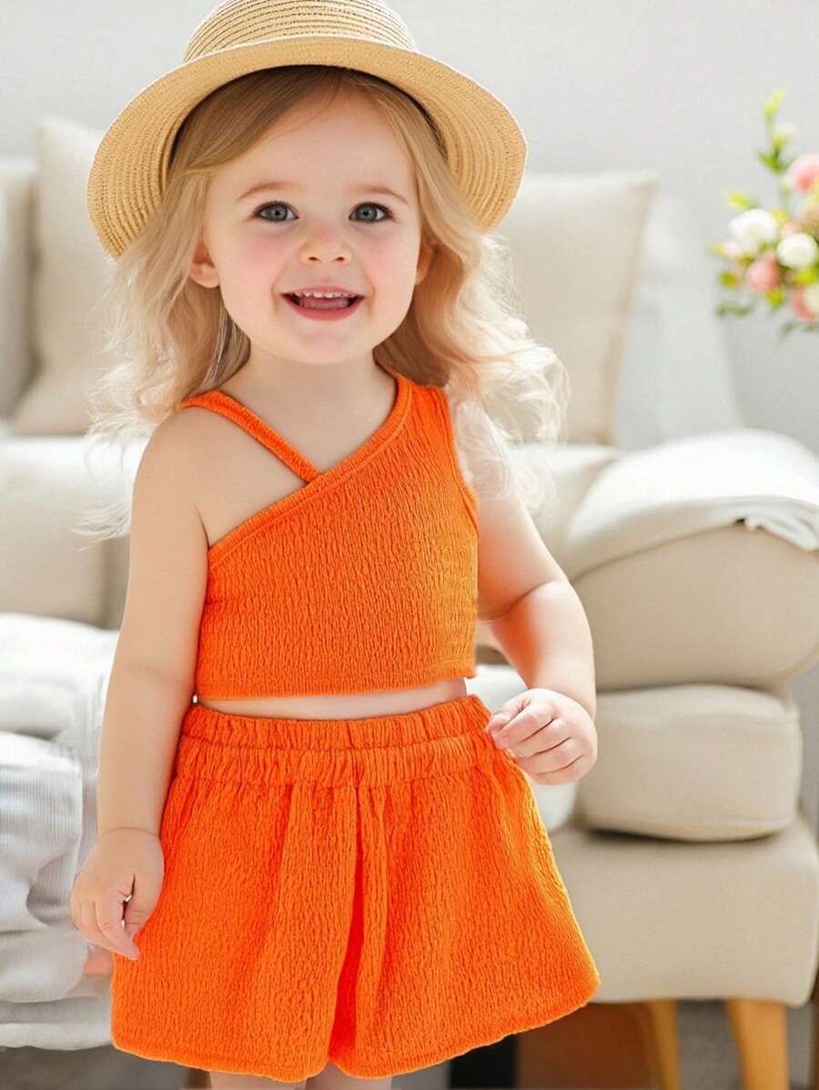 2 件套女婴休闲时尚日常百搭时尚橙色纯色舒适弹力贴身纹理针织不对称领口吊带背心上衣和宽松短裤 OOTD 服装，适合户外、度假、育儿活动或时尚摄影，春夏新品