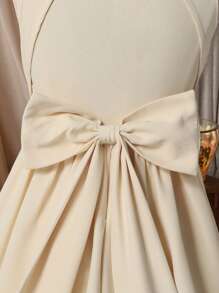 SHEIN Vestido elegante y de color amarillo pato para niñas preadolescentes, con cuello cuadrado de unicolor, sin mangas, espalda descubierta, decorado con gran lazo y empalme en forma de V. Vestido francés elegante y a la moda, ideal para volver al colegio, apropiado para graduaciones, bailes de promoción y fiestas de cumpleaños.