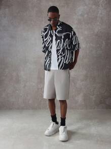 SUMWON Oversized Designer Shirt All Over Print Calligraphy Script Pattern Street Style Festival Party Club Short Sleeve Button Up Casual Contemporary Unique Fashion Statement - Black - View 6