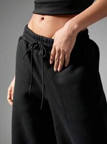 MISSGUIDED Leopard Star Print Wide Leg Athletic Joggers Palazzo Style Loungewear Yoga Dance Pants Comfortable Elasticized Waistband Holiday Winter Workout Bottoms - Black - View 4