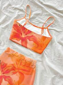 Soleia Bộ 2 món phong cách thường ngày đi nghỉ mát, họa tiết batik hoa ly cam và dâm bụt, gồm áo hai dây và chân váy thắt eo, thích hợp cho mùa hè đi chơi. - trái cam - Xem 5