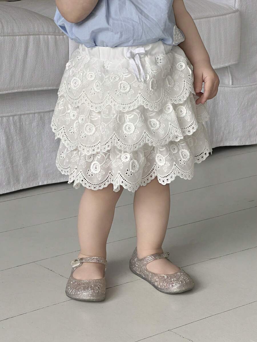 SHEIN Baby Girl 0-3 Years Spring/Summer Sweet Elegant Pastoral Vacation Versatile Crochet Embroidered Tiered Cake Skirt, All Season Baby Girl Clothes Skirt Baby Clothes For Girls Baby Girls Dresses Newborn Baby Girl Skirts Girl Clothes Baby Baby Skirt - White - View 1