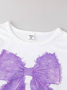 SHEIN Sparklyn Conjunto casual de 2 piezas para niñas preadolescentes con camiseta con lazo y jeans de mezclilla, para uso diario y de viaje - Morado - Ver 6