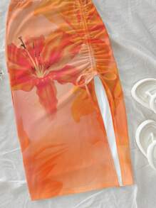 Soleia Bộ 2 món phong cách thường ngày đi nghỉ mát, họa tiết batik hoa ly cam và dâm bụt, gồm áo hai dây và chân váy thắt eo, thích hợp cho mùa hè đi chơi. - trái cam - Xem 6