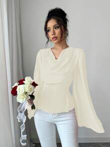 Chiquease Elegancka damska bluzka z długimi rękawami i rozkloszowanymi mankietami i kokardą