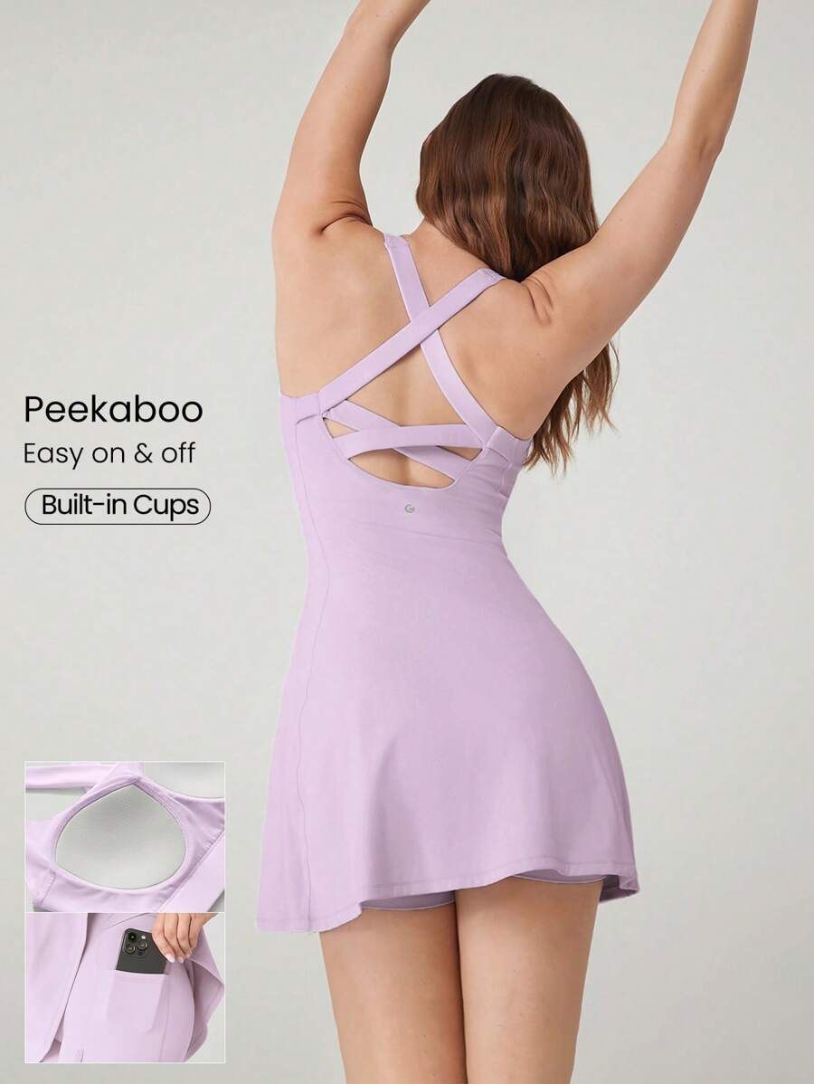 GLOWMODE Vestido activo con pantalones cortos incorporados, bolsillos laterales, agarre antideslizante y escote de tipo pico con tirantes cruzados en la espalda, diseño transpirable y de secado rápido "FeatherFit ™-Air" pensado para ganar, adecuado para tenis, golf, pickleball y uso diario