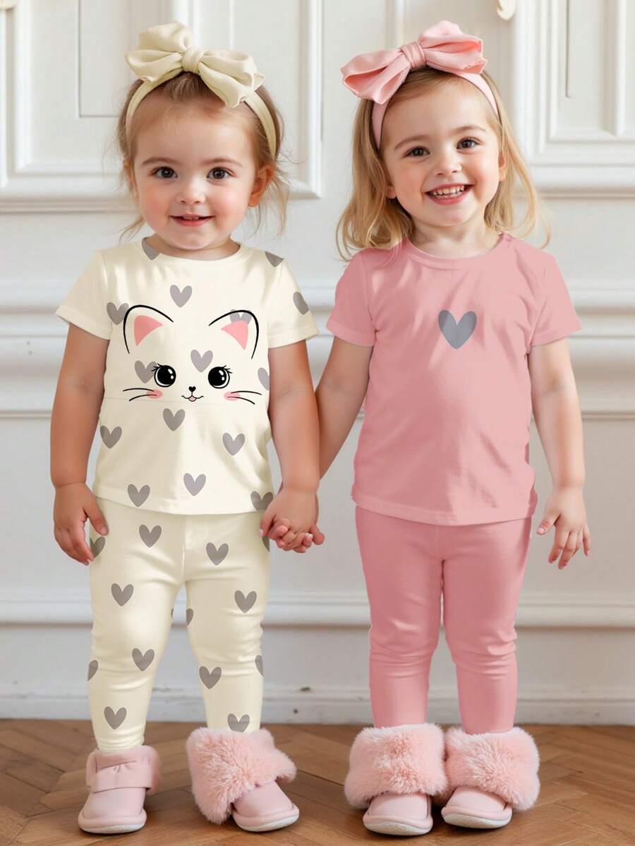 SHEIN Set de 2 piezas de camiseta de manga corta y leggings casual minimalista para bebé niña con estampado de corazón y gato, un conjunto de ropa interior cómoda