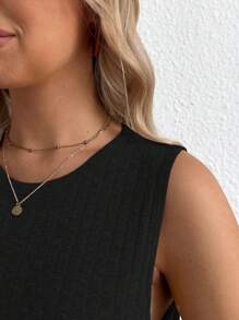 SHEIN Camiseta de tirantes casual de unicolor con cuello redondo para maternidad, dos estilos para usar durante y después del embarazo - Negro - Ver 4