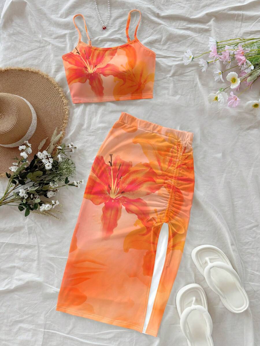 Soleia Bộ 2 món phong cách thường ngày đi nghỉ mát, họa tiết batik hoa ly cam và dâm bụt, gồm áo hai dây và chân váy thắt eo, thích hợp cho mùa hè đi chơi. - trái cam - Xem 1