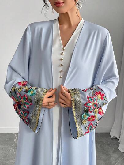 Al Najma Elegant Light Blue Abaya With Floral Embroidery, Maxi Length, And Long Sleeves For A Modest Style, Robe
